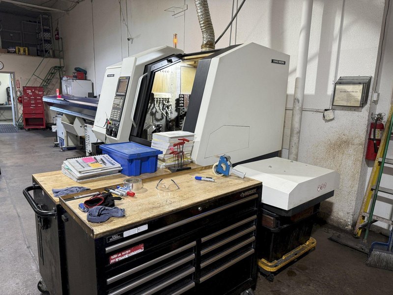 DMG Mori Sprint 32/8 CNC Screw Machine, Swiss Type, with Patriot Bar 
Feeder, Model 338