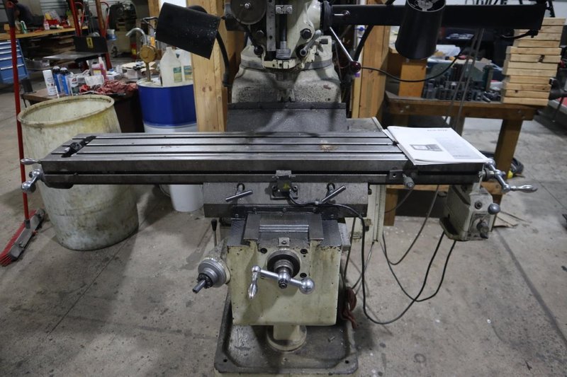 Trionics Handyman Vertical Knee Mill, Variable Speed, Accurite 2 Axis DRO, Power Table Feed- Auction Item