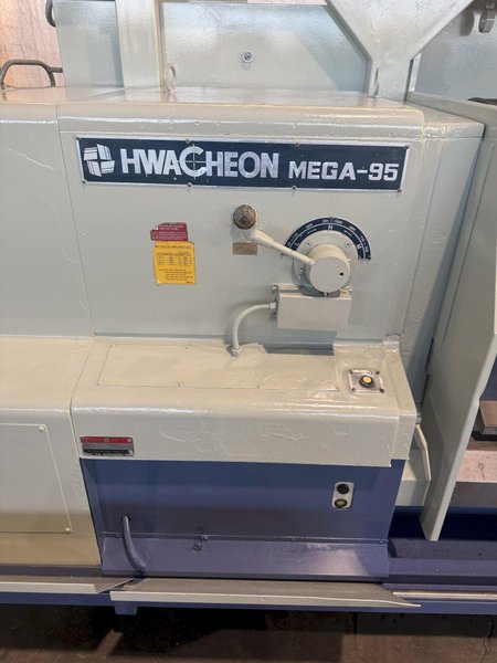 38.6" X 197" HWACHEON MEGATURN 95 CNC 9" HOLLOW SPINDLE OIL FIELD LATHE. STOCK # 0882125