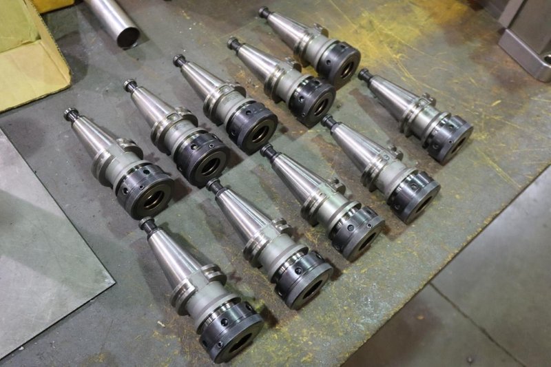 CT 40 Taper Tool Holders: (10) XCNA-1000 Collet Tool Holders- Auction Item