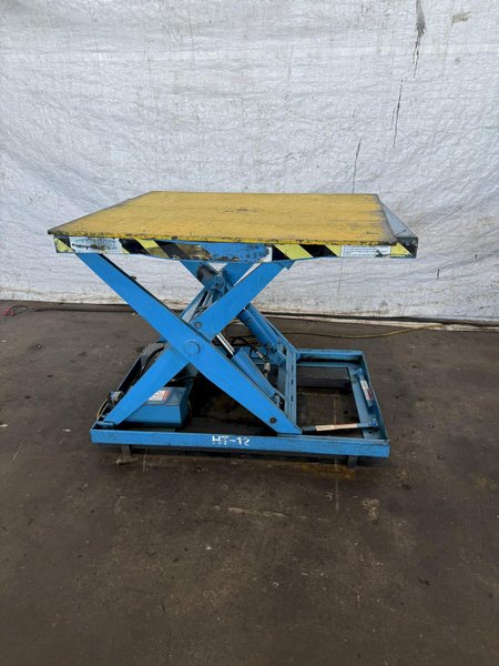 3,000 LB X 36" X 36" SOUTHWARK LIFT TABLE. STOCK # 0894824.