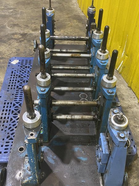 4 STAND X 1.5&quot; X 11&quot; YODER ROLLFORMER STANDS ON 6 STAND RAFTED BASE: STOCK #16781