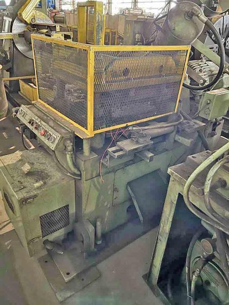 60–TON TISHKEN CUTOFF PRESS. STOCK # 1007125