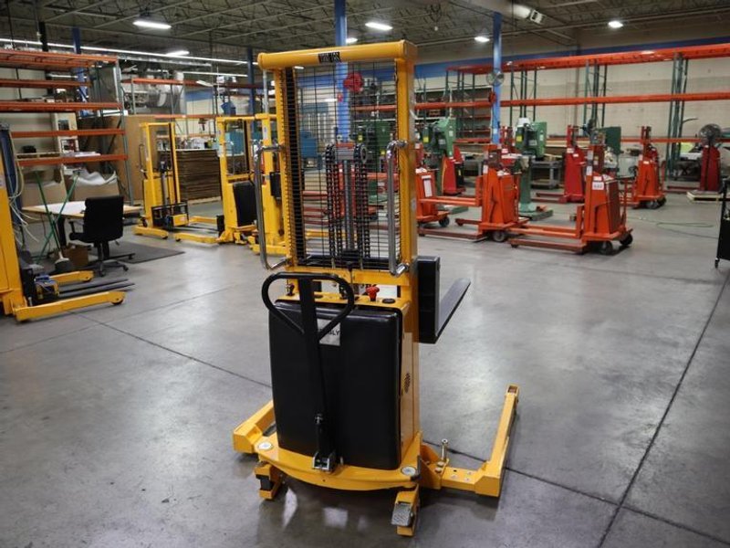 Uline H-5439 Electric Straddle Stacker Lift, 2,200# Cap, 63" Max Height, 50" Between Outriggers, 12 Volt Battery with Charger, 42" Forks- Auction Item