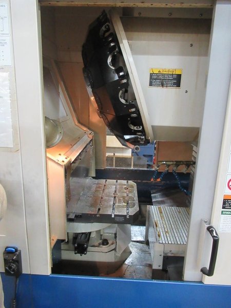 Daewoo Doosan 320/40 CNC Vertical Machining Center with 2 Station Pallet Changer, 12,000 RPM Spindle, 14 Station Rotary Turret, Chip Conveyor- Auction Item