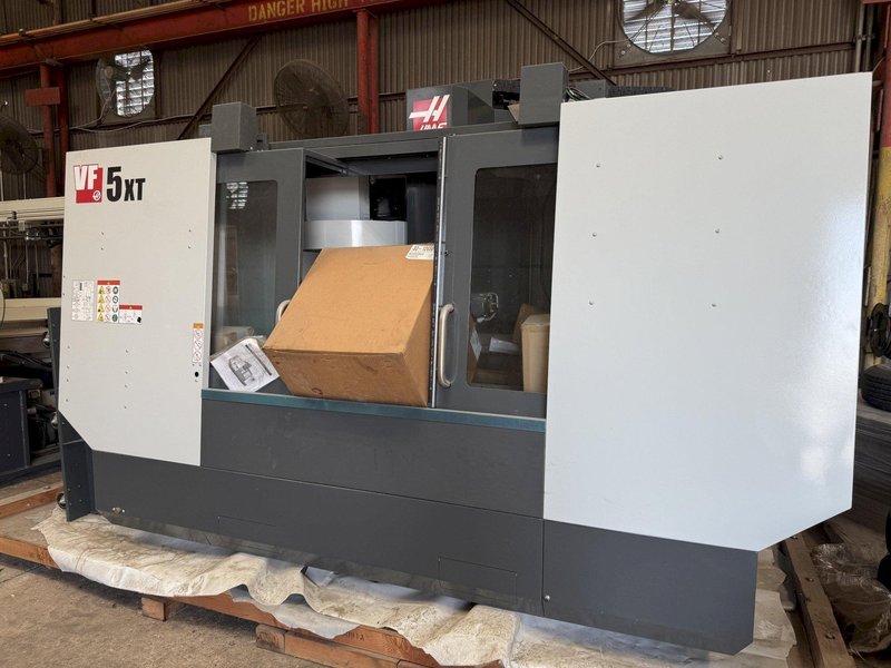 HAAS VF-5 / 40 XT VERTICAL MACHINING CENTER, 60 X 26 X 25&quot; TRAVELS, CTS, WIPS, AUTO DOOR, PCOOL, HSM, 2024 - NEW