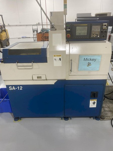 Nexturn SA-12 CNC Swiss Lathe, 2002 – BWG Bar Loader, Fanuc Control