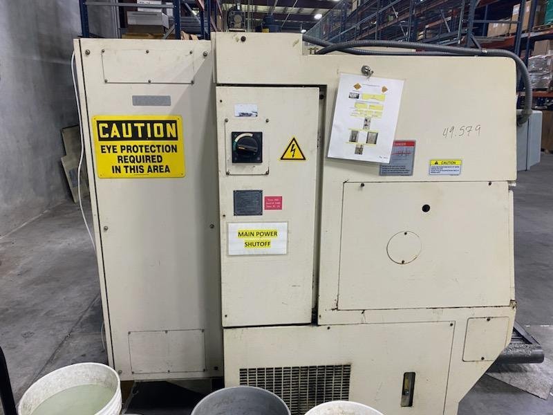 Okuma LU15 CNC Lathe, 2002 – Tailstock, Chip Conveyor