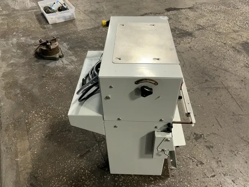 ALLIED AUTOMATION INC ROLL MACHINE   -  1055 ROLLBAG SEMIAUTO