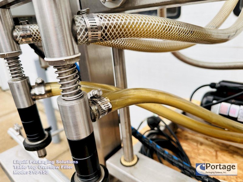 Liquid Packaging Solutions Model: 310-150  ||  Semi-Automatic Table Top Overflow Filler