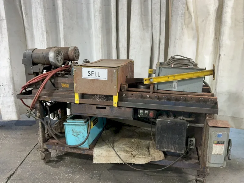 DUMORE DUAL HEAD TAPPING AND INSERTION MACHINE