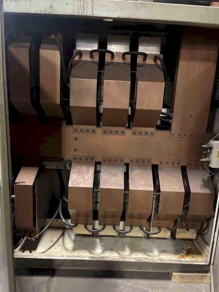 2000 Inductotherm model 1750-300 furnace power supply s/n 00f-123659-12 rated at 1750 kw, 1900 kva, 400 hz., 575 volt, with remote panel control box, original drain/feed manifolds