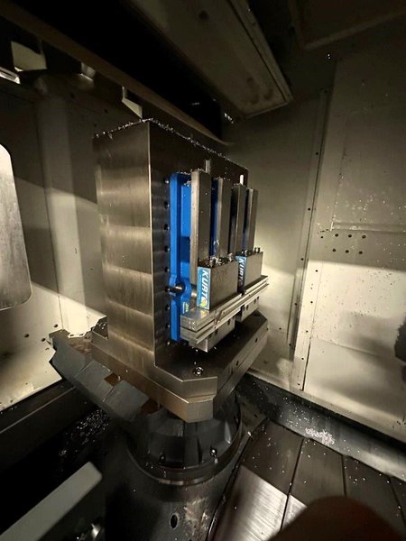 Haas EC-500 Horizontal Machining Center 2014 equipped with Haas CNC Control, CT40 Spindle, 70 Station Automatic Tool Changer, 4th Axis, Probing, Tomb Stones, TSC, Remote Hand Jog, Chip Conveyor, Coolant Pump