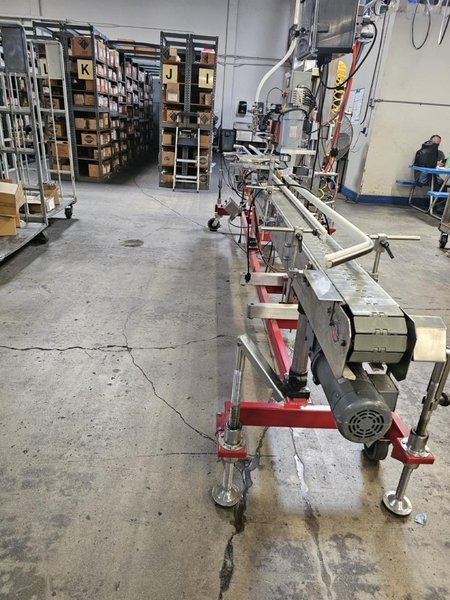 Accutek Bottling Line with Chadam Consultants 2 Head Gravity Filler, Accutek SA-1 Automatic Chuck Capper, Accutek APS106 Labelette Labeler, Everfilt Oil Filtration System, IBC Tanks