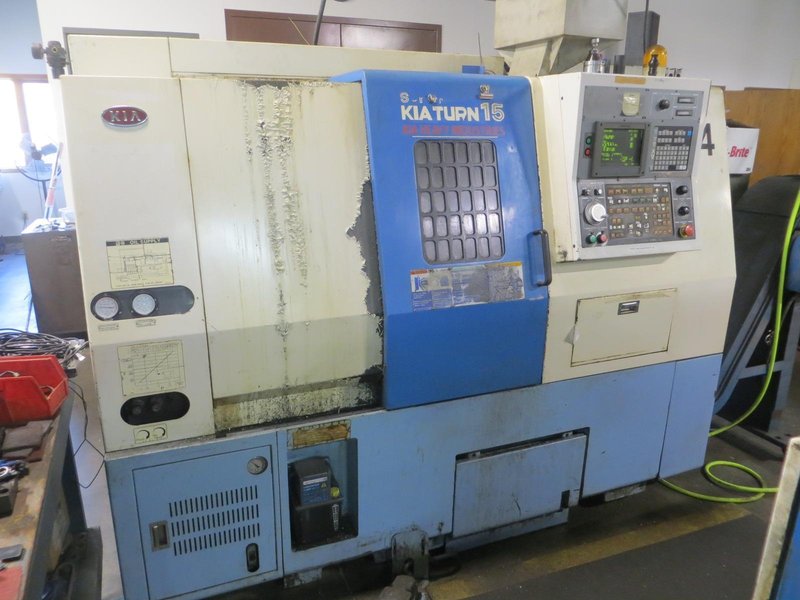 Kia Super KiaTurn 15 CNC Turning Center with Yasnac J50L CNC Control, 6&quot; 3-Jaw Chuck, Tool Setter, 12-Tools, Tailstock, Chip Conveyor and MORE!- Auction Item