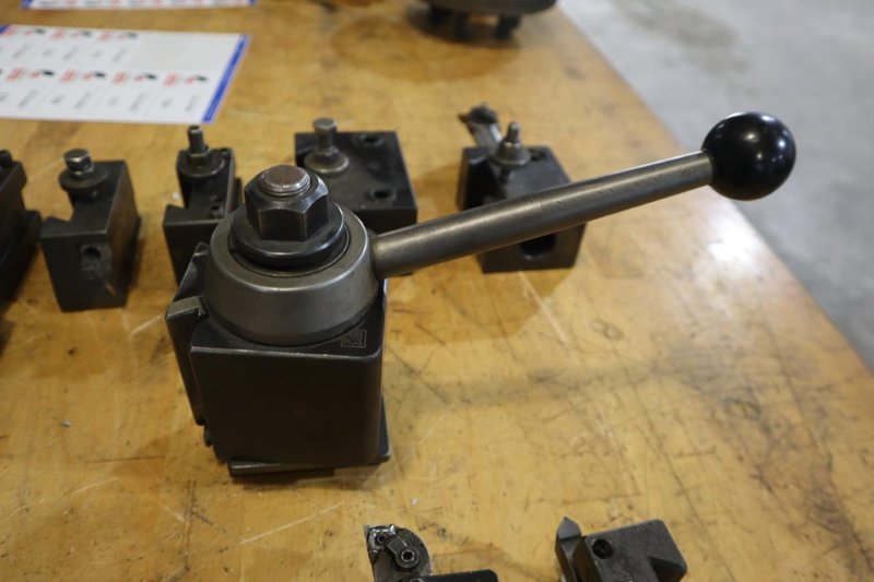 Aloris CXA Quick Change Tool Post with (7pcs) Assorted Tool Holders- Auction Item