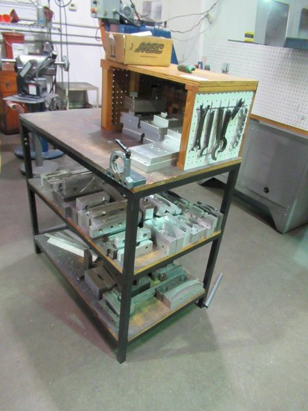Work Table with 40 Taper Tool Vise and Contents including Large Assortment of Aluminum Vise Jaws- Auction Item
