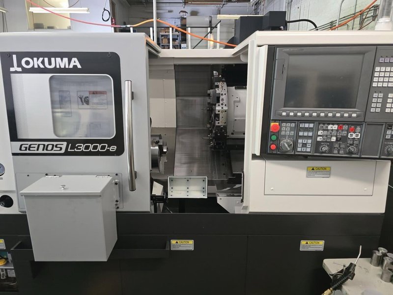 Okuma Genos L3000-e CNC Lathe, 2023 – Parts Catcher, Tailstock, Barfeed Interface