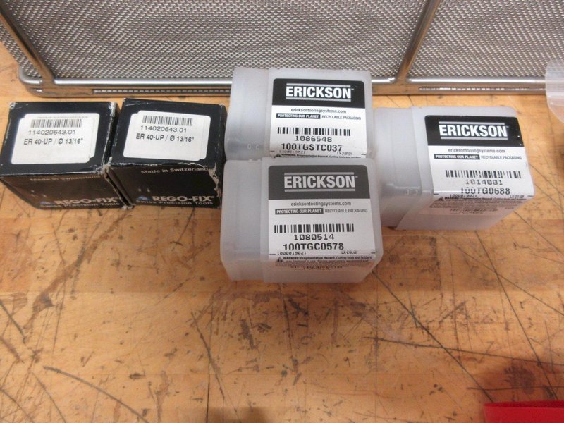 Mill Tool Holders Assorted CAT50, BT40, NMTB40, ER40 Collets, TG100 Collets, and 18x13x6" SST Wire Parts Basket- Auction Item