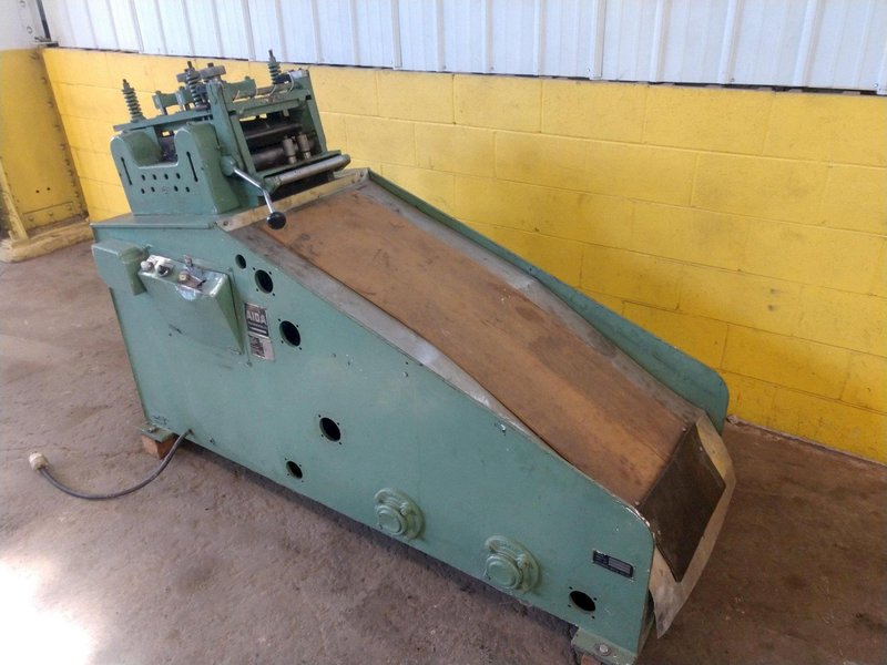 9.8" X .059" AIDA MODEL #LM-2532 9 ROLL POWERED COIL STRIP STRAIGHTENER: STOCK 14441