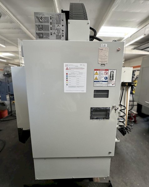 HAAS VM-2 CNC Vertical Machining Center 2011 equipped with quipped with 30"x20"x20" Travels, Haas Control, 4th Axis Drive, 24 ATC Side Mount Tool Changer, Tool Pre-Setter, Cool, Chip Auger