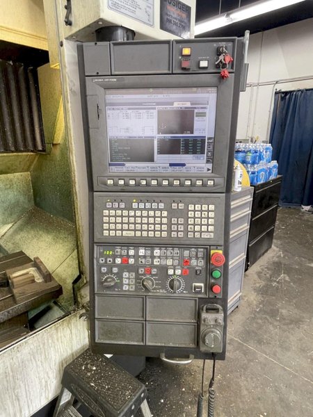 2014 Okuma Genos M560-V Bridge-Style CNC Vertical Machining Center with OSP-P300M Control