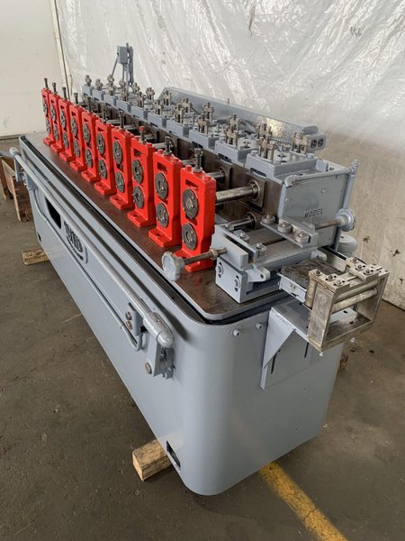 10 STAND X 1-1/2" X 8" TISHKEN MODEL 10LE 1-1/2 ROLLFORMER. STOCK # 0789324