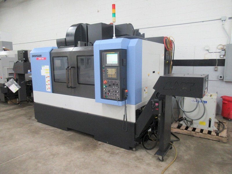 Doosan DNM 500 CNC Vertical Machining Center, 12K RPM Spindle, High Pressure Coolant, Renishaw Probing, Full 4th Axis, Chip Conveyor