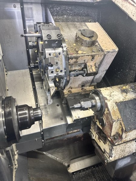 Okuma ES L8 CNC Lathe, 1999 – Tailstock, Chip Conveyor