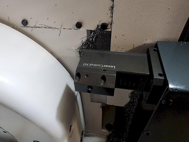 Okuma Genos M460V-5AX 5-Axis CNC VMC, 2021 – Robot Loader, Chip Conveyor, Mist Collector