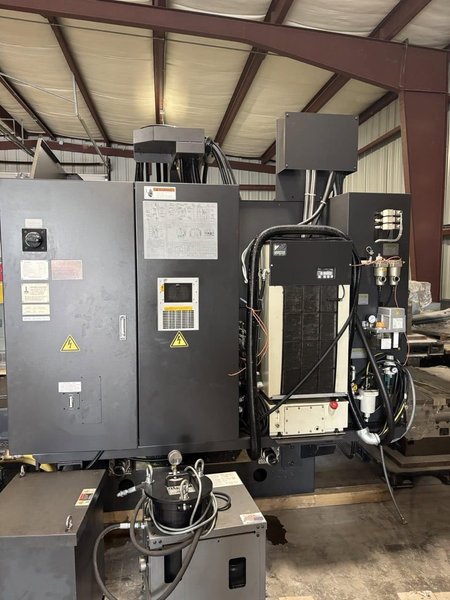 Okuma Genos M560-V VMC, 2021 – 15k Spindle, Chip Conveyor