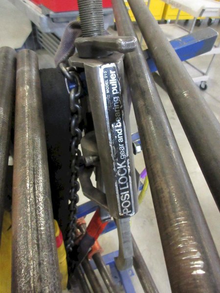 Rolling Cantilever Rack with Large Assortment of Clamps, Come-Along, Posi-Lock 210 Bearing Puller, Caldwell 76E 4800 LBS Batter Lifting Bar- Auction Item