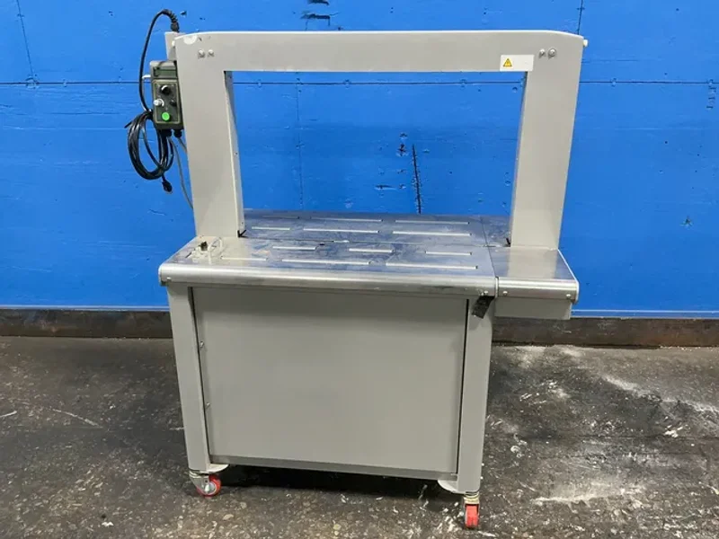 PAC STRAPPING PRODUCTS, INC. 25”X33.5” AUTOMATIC ARCH STRAPPING MACHINE  -  SM65