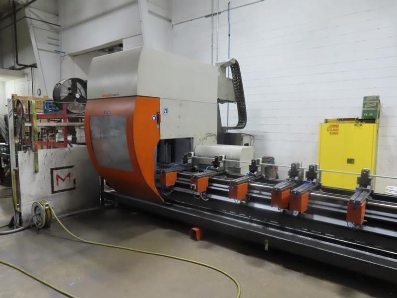 Elumatec SBZ 5-axis CNC Profile Machining Center, 5-Axis CNC Control, 10.3M / 33.8' X-Axis Travel, 20-ATC, 500mm Blade, 24,000 RPM
