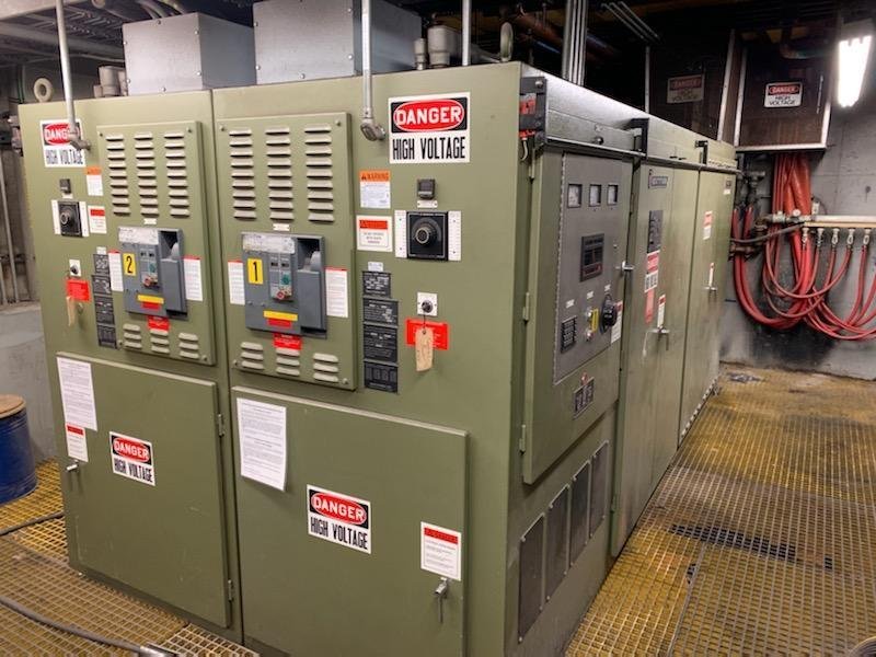 2000 Inductotherm model 1750-300 furnace power supply s/n 00f-123659-12 rated at 1750 kw, 1900 kva, 400 hz., 575 volt, with remote panel control box, original drain/feed manifolds