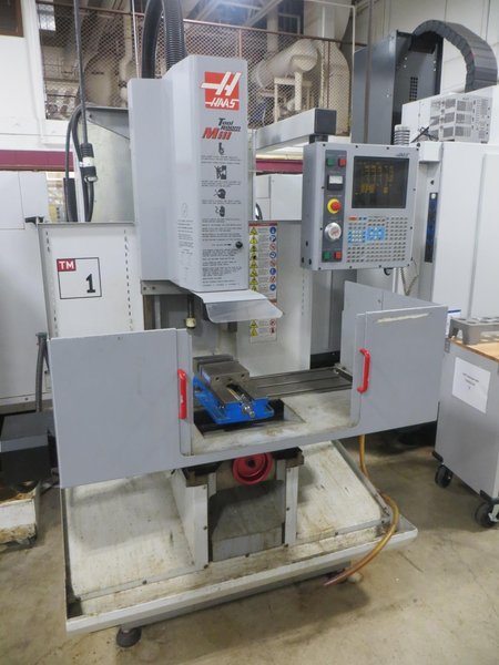 Haas TM-1 CNC Tool Room Mill, Haas 32-Bit CNC Control, 40 Taper, Splash Guards, Coolant Tank &amp; Pump- Auction Item