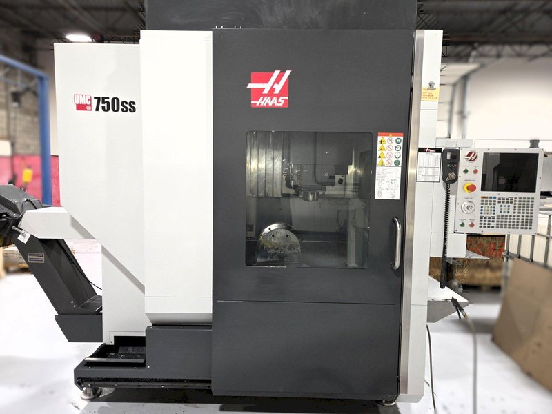 Haas UMC-750SS 5-Axis 2018 with: 5th Axis, 12k RPM Spindle, Through Spindle Coolant, 40 ATC,  Probing, Chip Conveyor, and Coolant Tank.