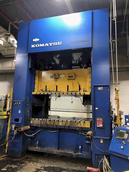 300 TON KOMATSU STRAIGHT SIDE PRESS, MODEL E2G300U, 14.2" STR, 28.3" DIE HEIGHT, 10.2" ADJ, 86" LR X 55" FB BA, 12-40 SPM VARI, YEAR 1988