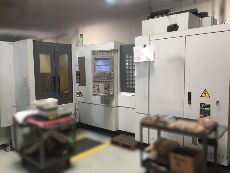 Mori Seiki NH4000DCG HMC 2010 - 6-Pallet FMS System, 4th Axis, 180 ATC
