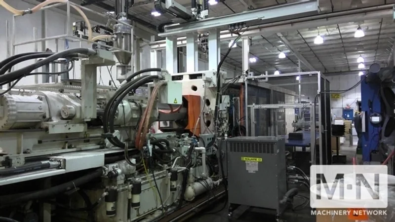 1000 TON 185 OZ UBE MODEL UM1000 INJECTION MOLDING MACHINE MFG 1999