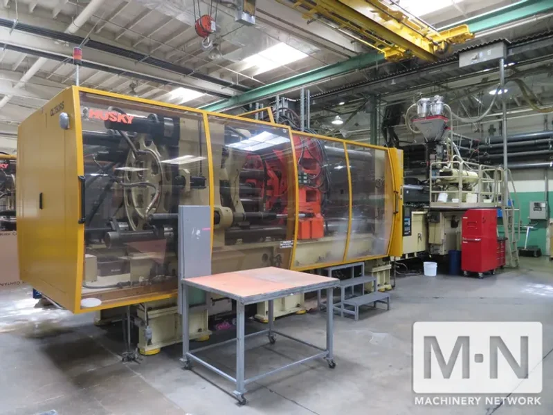 825 TON 132 OZ  HUSKY MODEL GL750GENRS120/100 INJECTION MOLDING MACHINE  MFG 1999