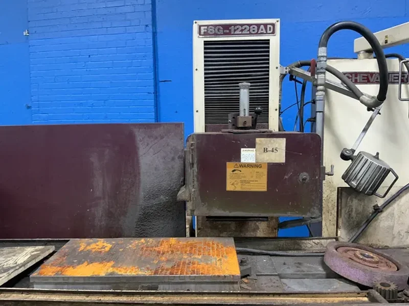FALCON CHEVALIER MACHINERY INC. 12”X23.5” TABLE SURFACE GRINDER  -  FSG-1228AD