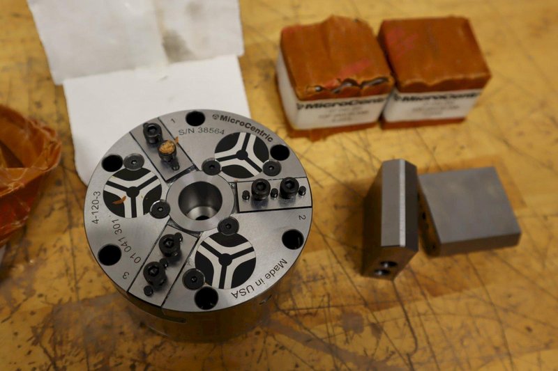 Microcentric 4-120-3, Rotating Air Chucks, 4" 3-Jaw with (2) 07 045 200 Top Jaw Blanks, Missing ***New in Packaging***- Auction Item