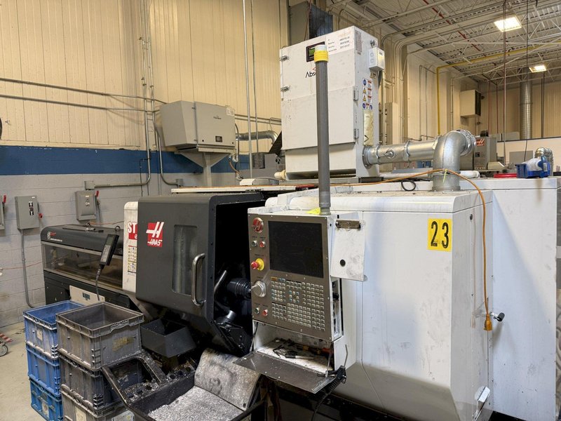 Used 2012 Haas ST-20 CNC Lathe with Bar Feeder For Sale