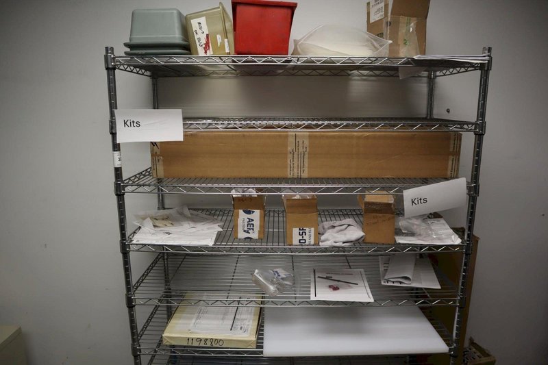 Rolling Adjustable Shelf Wire Racking with 10 Shelves and Contents- Auction Item