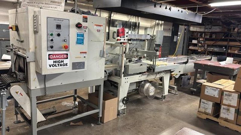 Texwrap 2219 Automatic Shrink Wrapper with Closing Conveyor for Small Product, Extended Lugged Infeed and Texwrap T-1322 Dual Chamber Heat Tunnel, 2001 – Need Gone ASAP