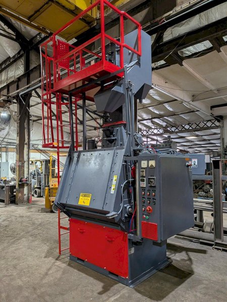 2012 DeLong 7 super model DSTB7 rubber belt tumblast machine s/n 0066281 rated at 7 cu ft capacity, 20hp direct drive shot wheel, offered rebuilt