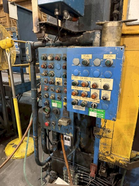 1500 TON MINSTER KNUCKLE JOINT PRESS WITH 12" STROKE. STOCK # 0328426