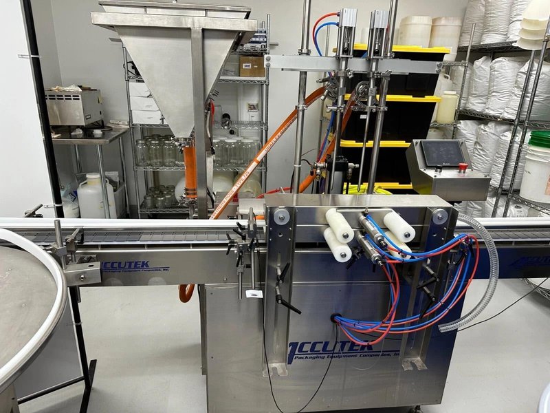 Accutek Hot Fill Bottle Filling Line with AVF2-16 2-Head Volumetric Bottle Filler with Heated Hopper, 2018 – Previously ran 1 Oz, 2 Oz, 4 Oz, 8 Oz, and 16 Oz Boston round Bottles and 1 Oz and 4 Oz Topical Jars