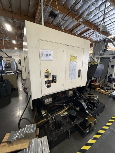 YCM NXV560A-APC VMC, 2015 – Chip Conveyor, Fanuc Control, 12K RPM